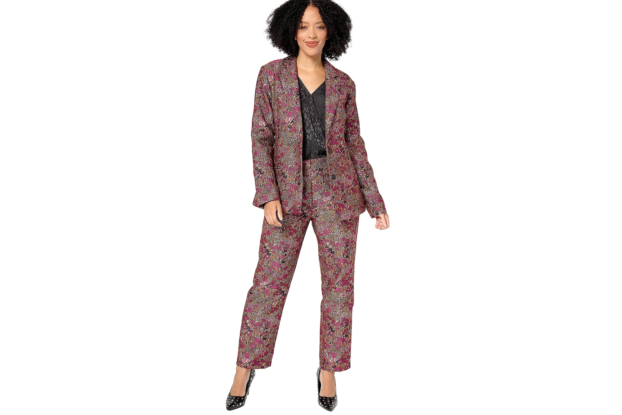 Model with a floral brocade blazer and trousers