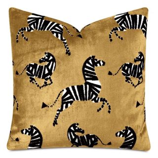 Mustard yellow cushion with zebra stripes