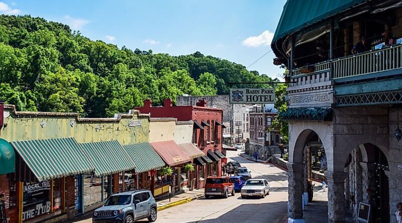 Downtown Eureka Springs, AR, with shopping malls and famous buildings.